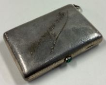 A fine early 20th Century silver combination cigarette case / compact with green stone pusher.