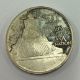 A silver Elizabeth II Five Dollar coin. - Image 1 of 2
