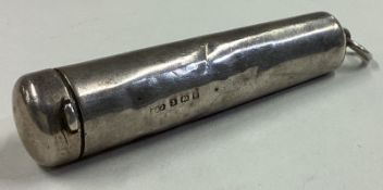 A silver cheroot holder.