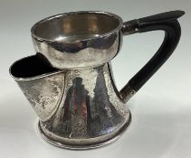 A novelty silver shaving mug with lift-off cover.