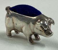 A modern silver pin cushion in the form of a pig.