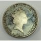 A silver Elizabeth II Five Dollar coin. - Image 2 of 2