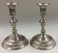A pair of 17th / 18th Century Queen Anne silver tapersticks.
