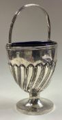 An 18th Century silver swing handled basket with BGL.