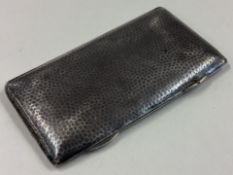 CHESTER: A silver triple stamp case with hammered decoration.