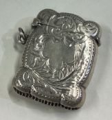 An engraved silver vesta case.
