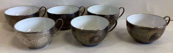 A cased set of six silver teacups.