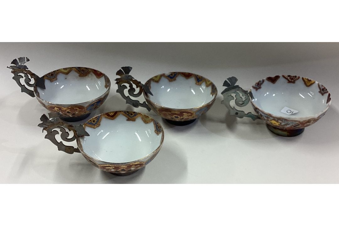 A set of four silver mounted cups with pierced handles. - Image 2 of 2