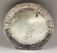 A silver teapot stand.