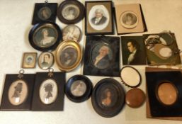 A collection of miniatures and miniature frames.