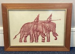 A framed and glazed picture depicting ceremonial elephants.