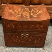 An early inlaid caddy of shaped form.