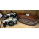 Two Canon cameras together with a leather basket. - Image 1 of 2
