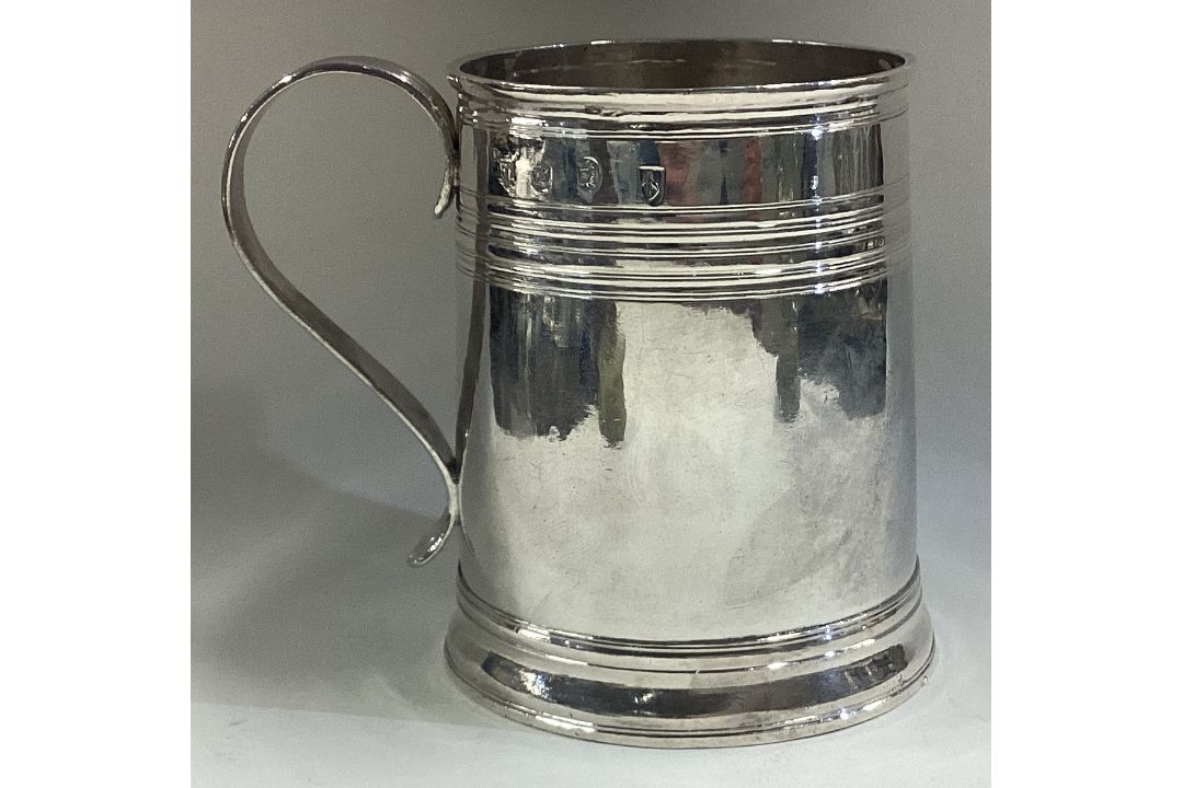 A Queen Anne Britannia Standard silver mug with reeded decoration. - Image 1 of 3