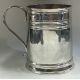 A Queen Anne Britannia Standard silver mug with reeded decoration. - Image 1 of 3