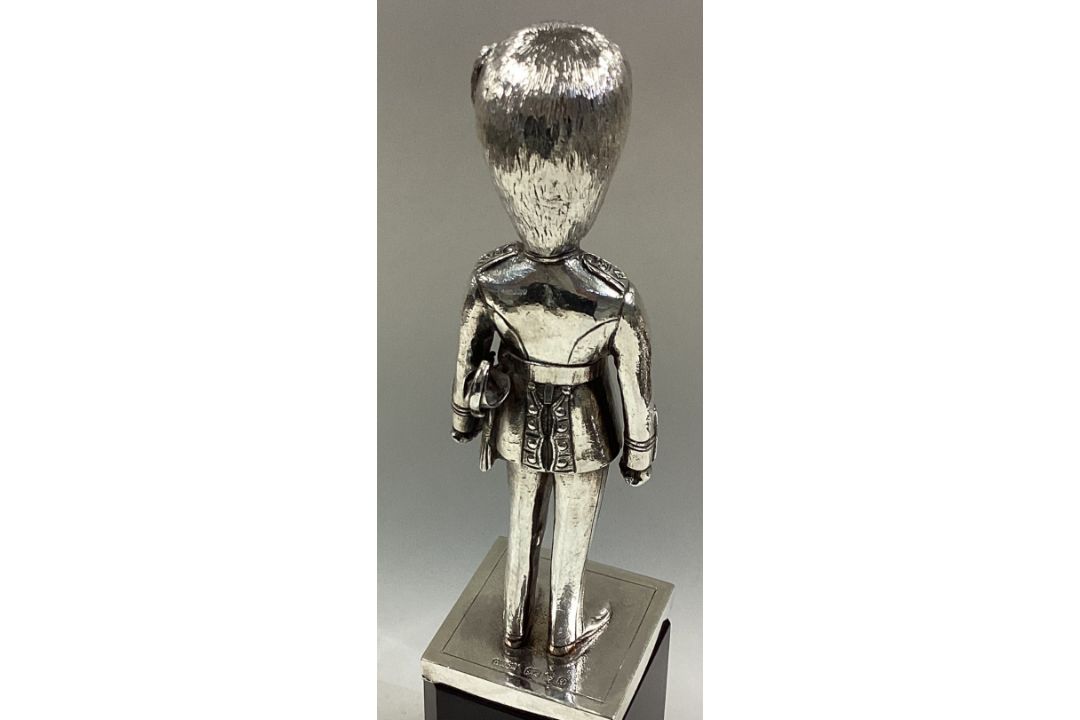 A cast silver figure of a Grenadier Guard. - Image 2 of 2