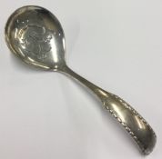 GEORG JENSEN: A pierced silver ladle.