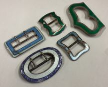 A mixed lot of silver and enamelled buckles.