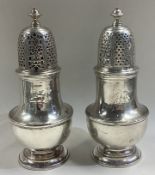 A fine pair of heavy 18th Century George II silver sugar casters.