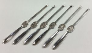 A set of six silver plated lobster picks.