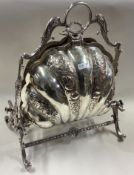 A silver plated revolving dish.