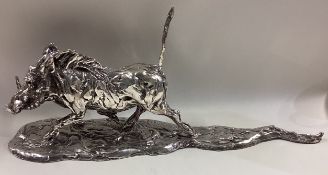 A large Zimbabwean silver figure of a boar.