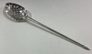 An 18th Century silver mote spoon.