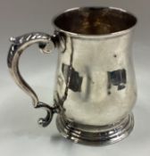 An 18th Century George III silver pint mug.