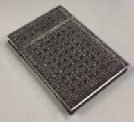A 19th Century filigree silver card case with hinged cover.