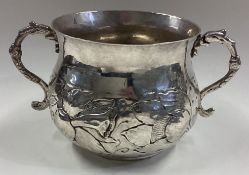 A 17th Century silver porringer.