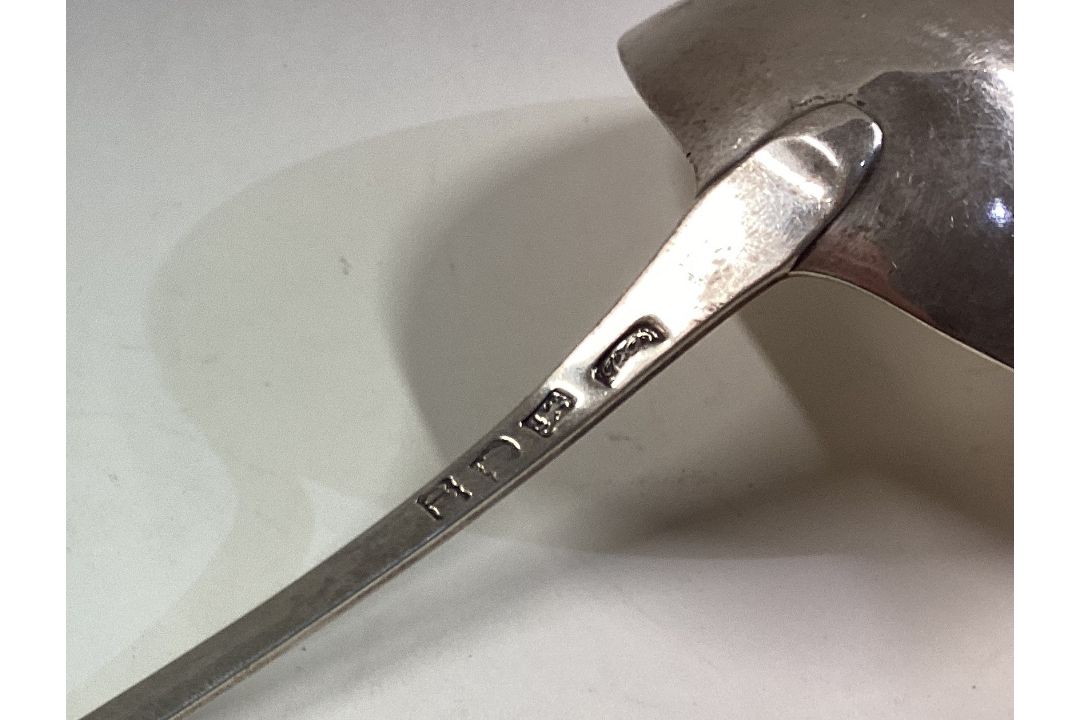 An 18th Century silver bottom marked soup ladle. - Image 2 of 2