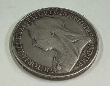 A Victorian silver Crown coin. Dated 1897.