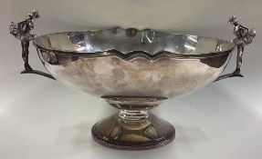 An unusual silver presentation bowl cast with figu