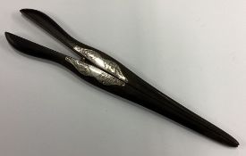 A pair of silver mounted glove stretchers.