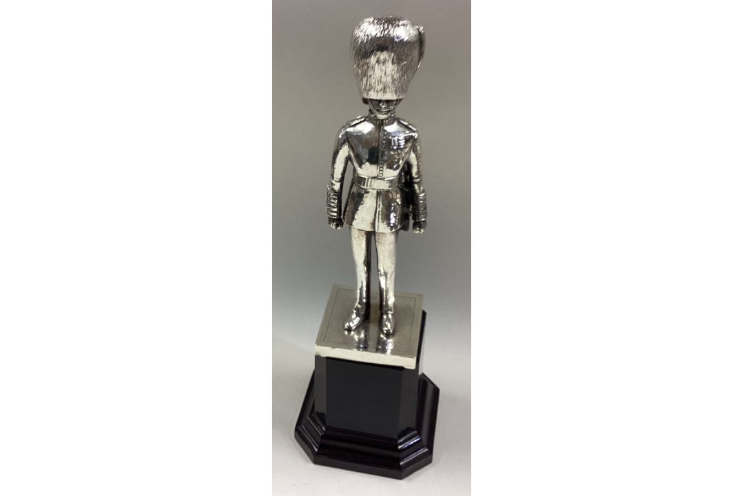 A cast silver figure of a Grenadier Guard. - Image 1 of 2