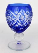 Suite of Blue Overlay Crystal Glasses & Decanters
