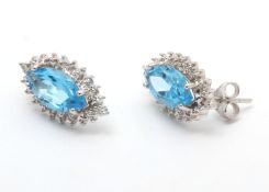 9ct White Gold Diamond and Blue Topaz Earring (BT3.73) 0.02 Carats