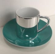 Damian Hurst (B 1965) Silver Electroplate ‘For The Love of God’ Anamorphic Cup and Saucer, 2007