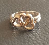 Tiffany and Co Three Heart Ring.