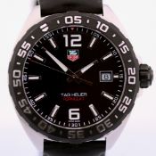 Tag Heuer / Formula 1 Date - Gentlemen's Steel Wristwatch