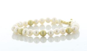 Freshwater Cultured 5.5 - 6.0mm Pearl Bracelet With Gold Plated Silver Clasp and Fastening