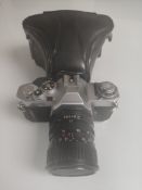 A Canon SLR AV-1 35mm Camera With A Rare Canon 35-70mm Lens.