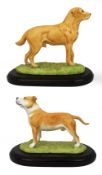 Pair of Porcelain Dogs On Plinths