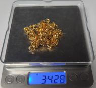 A Yellow Metal Curb Chain. Approximately 34.28G. Excellent Condition.