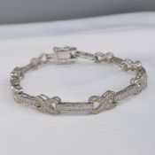 Stylish Sterling Silver Ribbon-Style Bracelet, Gem Set