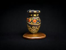 Antiquities: Roman Cobalt, Red, and White Glass Bottle