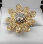 A Two-Colour Floral Gold Diamond Ring With Valuation