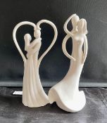 A Pair of Circle of Love Statues