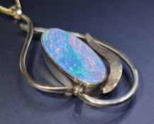 A Stunning 9ct Gold Australian Black Boulder Opal Pendant with a 9ct Gold Chain – 9.2g.