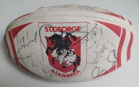 A fully signed St George Illawarra Dragons rugby ball from Australia.